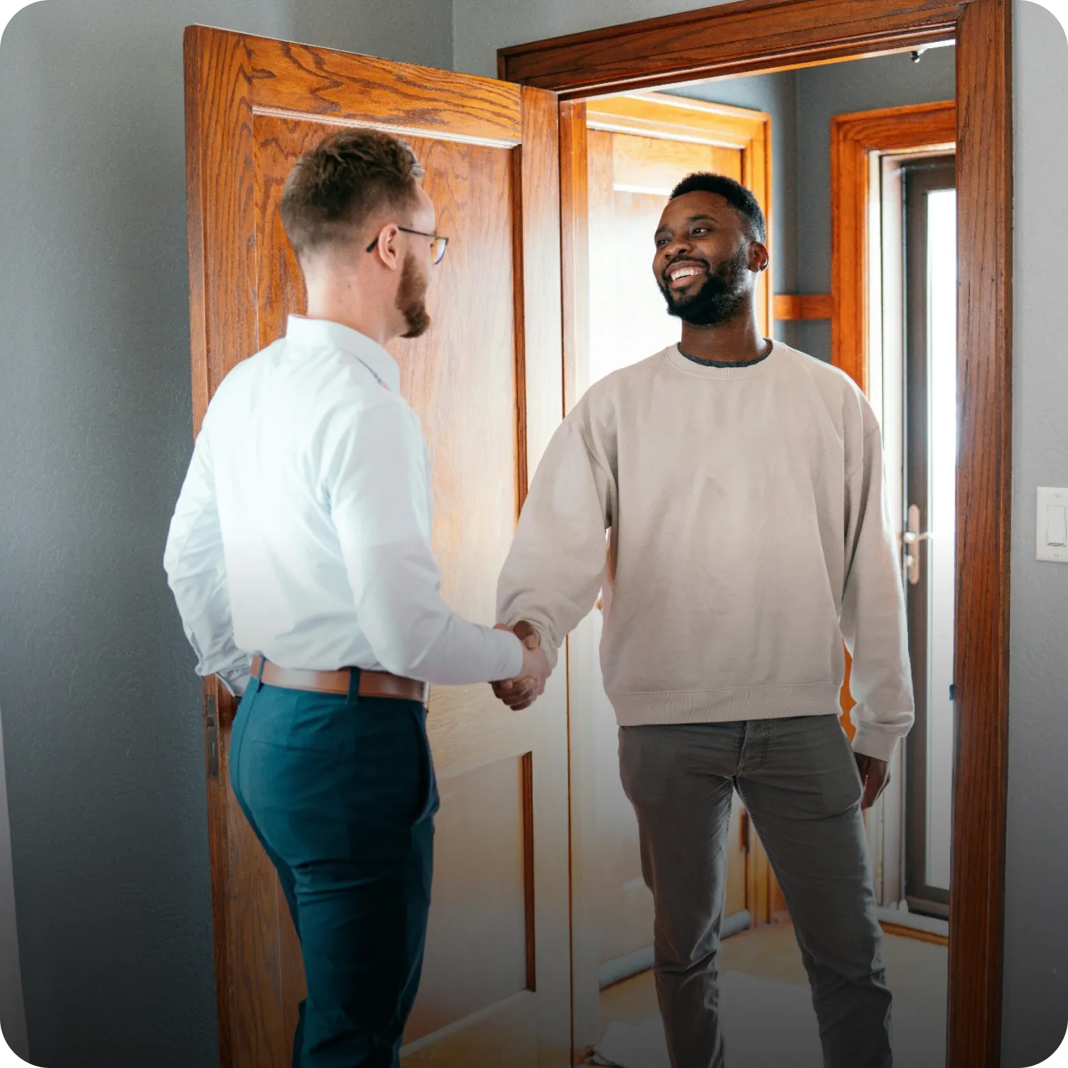 A property buyer and agent meeting in person after connecting by phone through Callr